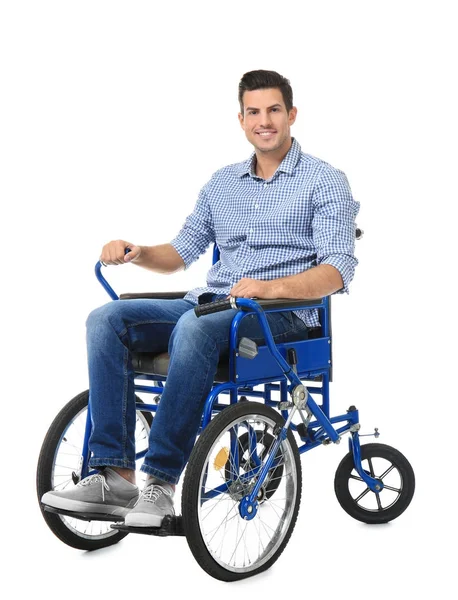 Attractive young man in wheelchair on white background — Stock Photo, Image