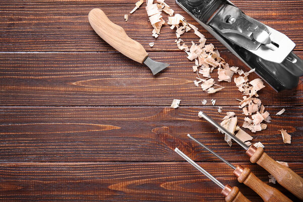 Carpenter's tools on wooden table