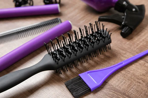 Professional hairdresser set on wooden table — Stock Photo, Image