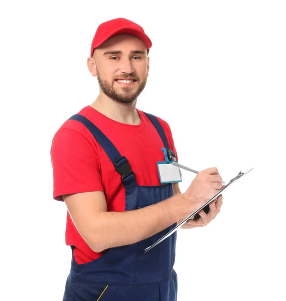 Handsome auto mechanic with clipboard on white background — Stock Photo, Image