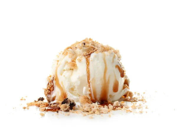 Ice cream ball covered with caramel sauce and crumbled cookies on white background — Stock Photo, Image