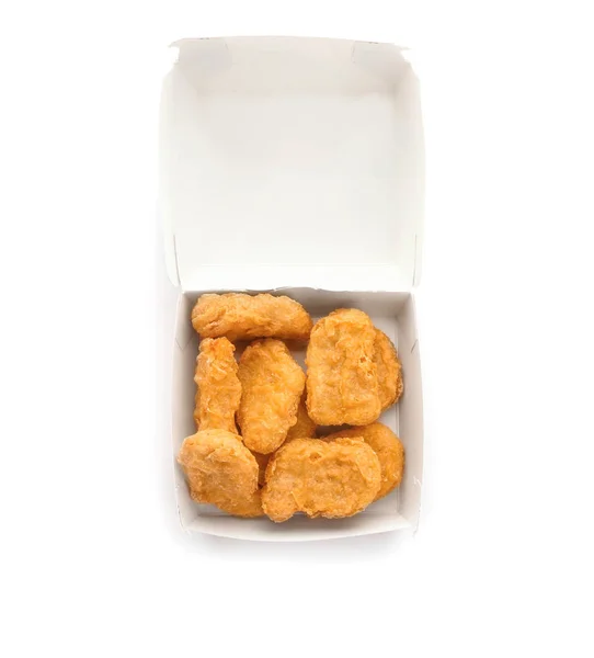 Pudełko z tasty chicken nuggets na białym tle — Zdjęcie stockowe