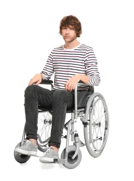 Joven en silla de ruedas sobre fondo blanco — Foto de Stock
