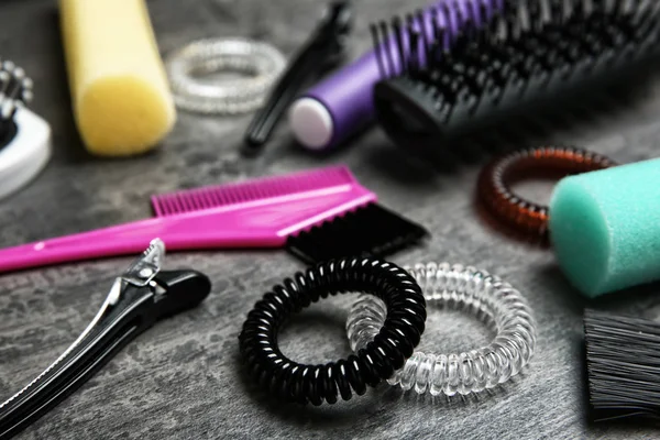 Professional hairdresser set on gray table — Stock Photo, Image