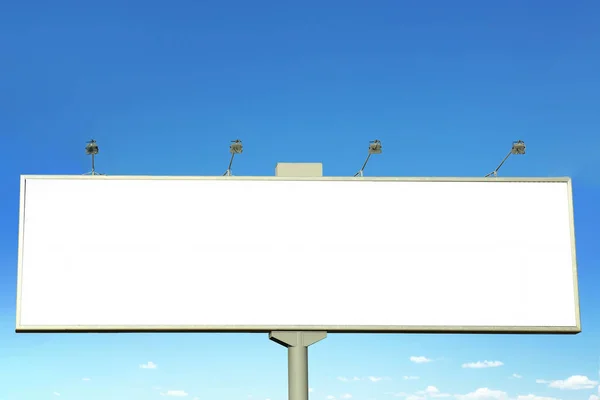 Blank advertising board on blue sky background Stock Image