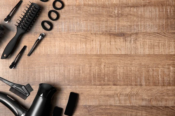 Professional hairdresser set on wooden table — Stock Photo, Image