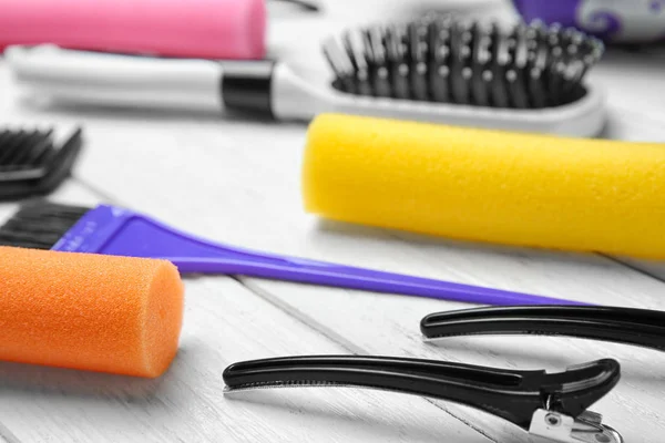 Professional hairdresser set on wooden table — Stock Photo, Image