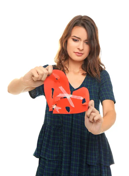 Young Woman Holding Torn Paper Heart White Background — Stock Photo, Image