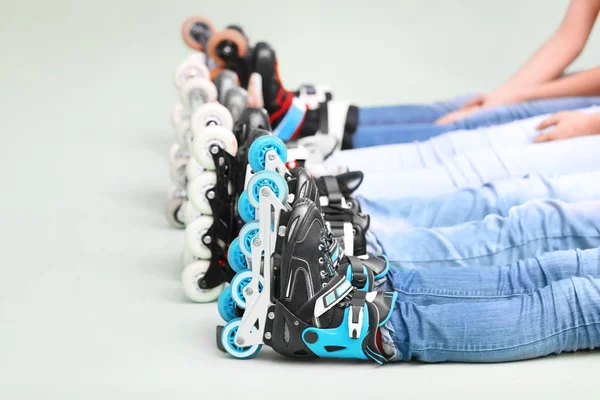 Group People Wearing Roller Skates Light Background — Stock Photo, Image