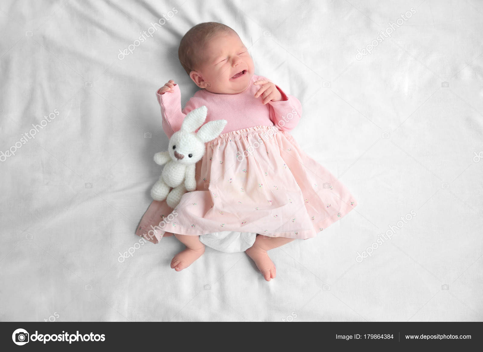 Cute Newborn Baby Girl Lying On Bed Stock Photo By C Belchonock