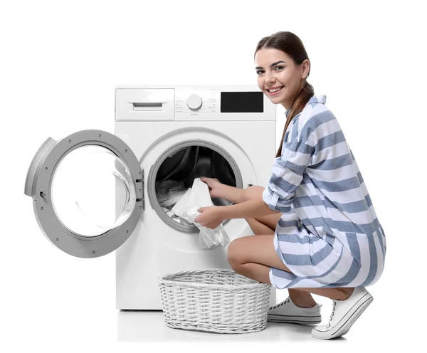 Mujer Joven Lavando Ropa Sobre Fondo Blanco —  Fotos de Stock