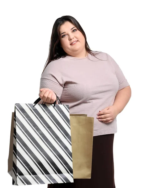 Mulher com sobrepeso com sacos de compras — Fotografia de Stock