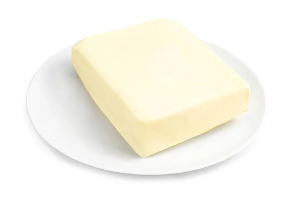 白い背景の上健康な新鮮なバター プレート ストック写真