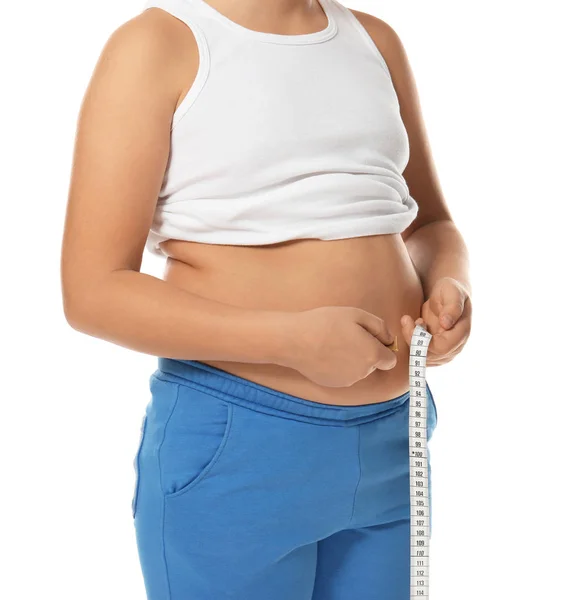 Chłopiec pomiar talii z nadwagą — Zdjęcie stockowe