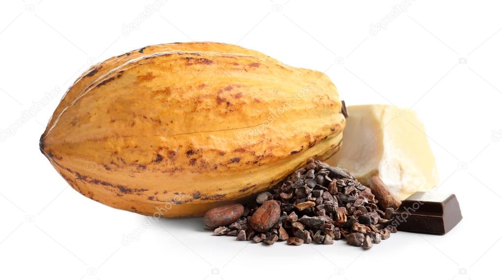 Cocoa pod and products on white background