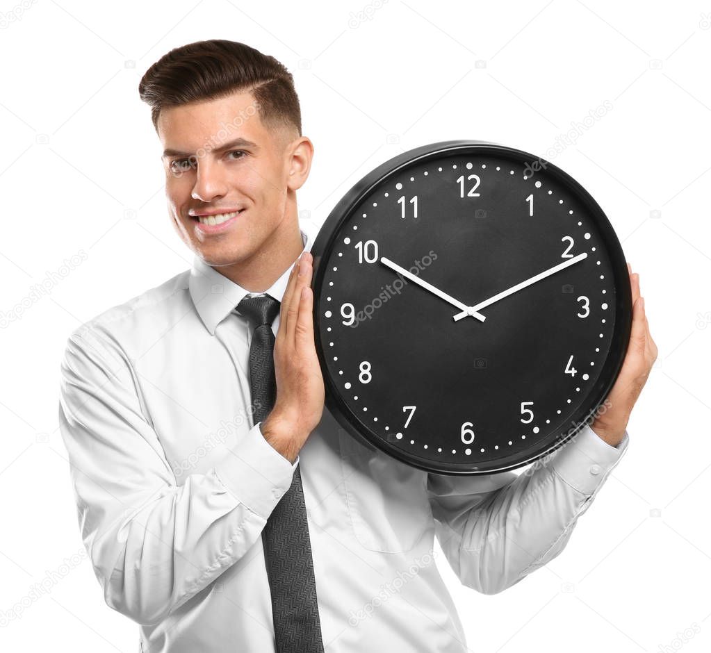 Handsome manager with clock on white background
