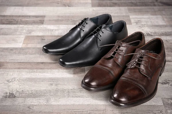 Elegant leather men\'s shoes on floor