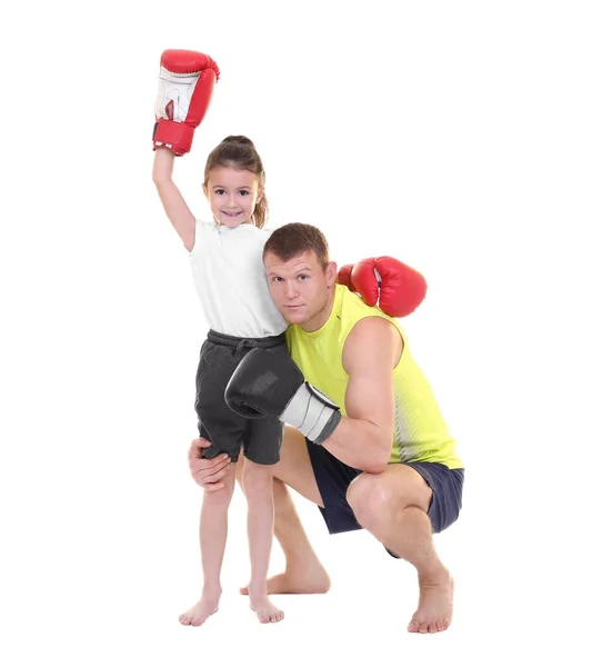 Carino bambina con allenatore di boxe su sfondo bianco — Foto Stock