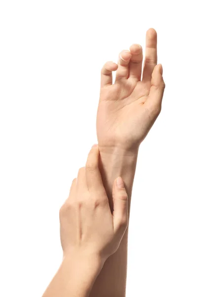 Hands of young woman with healthy skin softened by cream with moisturizing effect, on white background — Stock Photo, Image