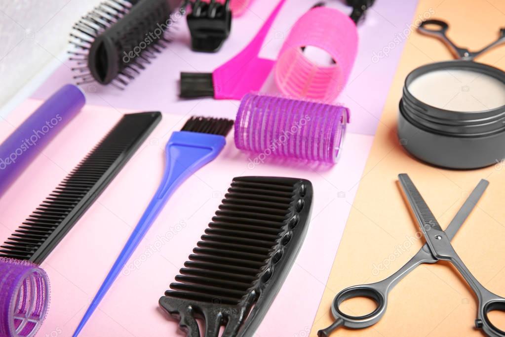 Professional hairdresser set on color background