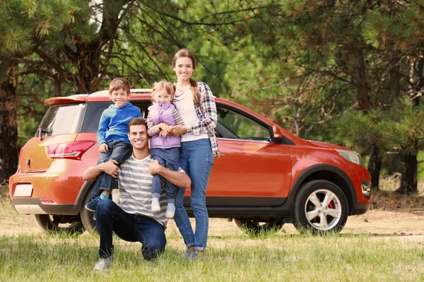 Happy family near modern car outdoors — Stock Photo, Image