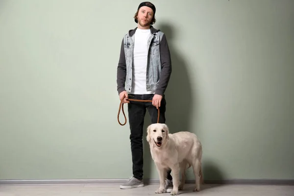 Young hipster with dog — Stock Photo, Image