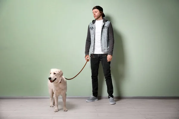 Young hipster with dog — Stock Photo, Image