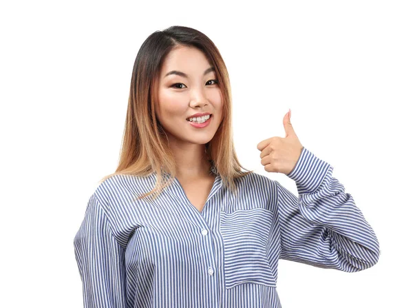 Smilende kvinde viser tommelfinger op - Stock-foto