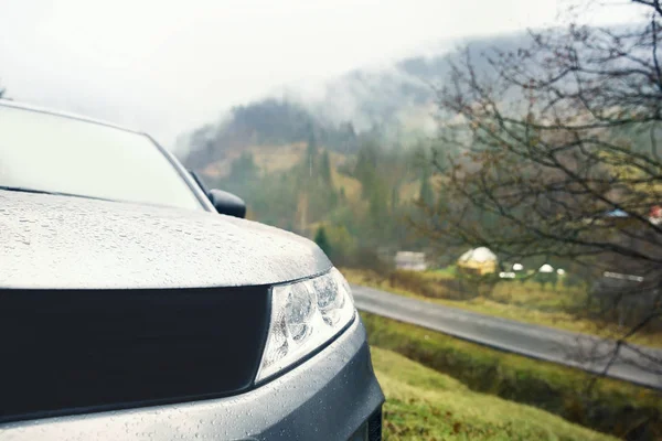 Front view of car in rainy weather