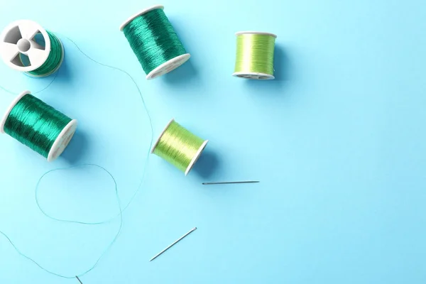 Set of sewing threads with needles — Stock Photo, Image