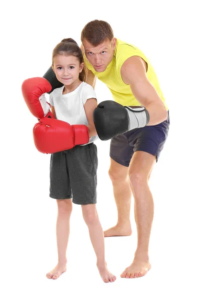 Cute little girl with boxing coach on white background — Stock Photo, Image