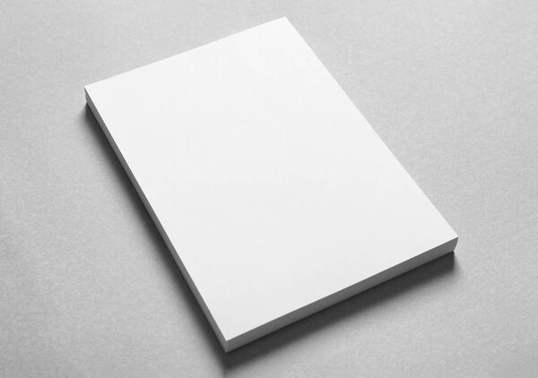 Blank sheets of paper on light background. Mock up for design