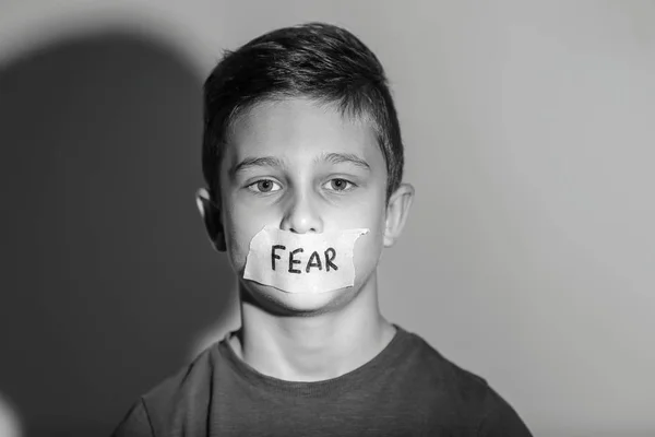 Sad Little Boy Taped Mouth Word Fear Grey Background Black — Stock Photo, Image