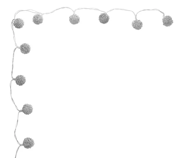 Weihnachtsbeleuchtung auf weiß — Stockfoto