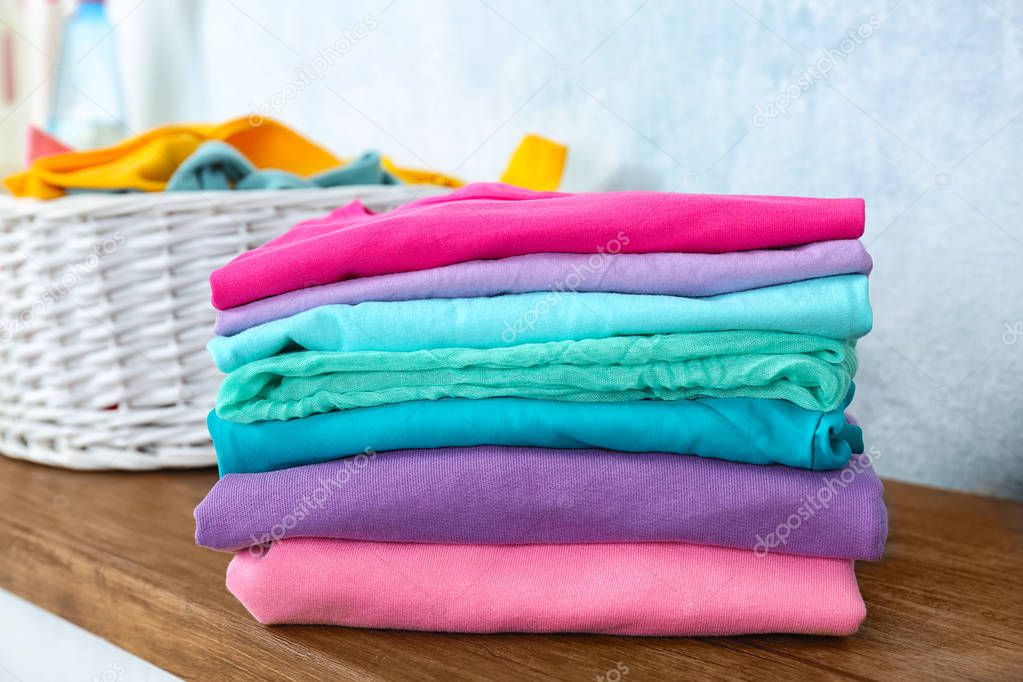 Stack of laundry on table, indoors