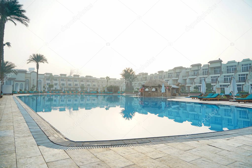 Territory of modern hotel with swimming pool