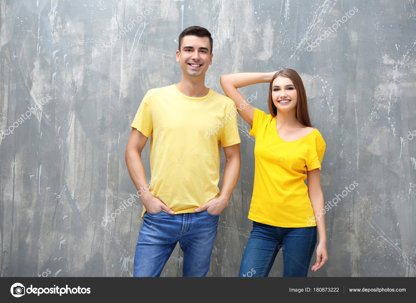 Download Young Woman Man Yellow Shirts Grunge Background Mockup Design Stock Photo C Belchonock 180873222 PSD Mockup Templates