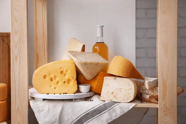 Variety of cheese on storage stand