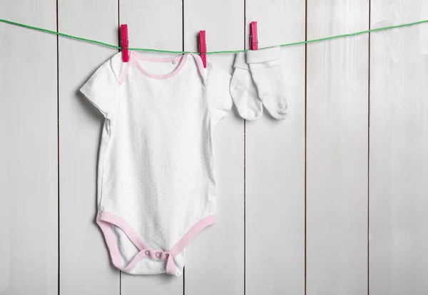 Children Clothes Laundry Line Wooden Background — Stock Photo, Image