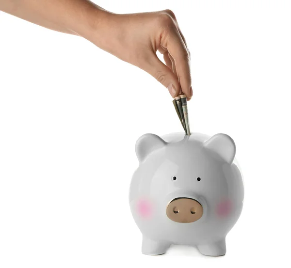 Vrouw Bankbiljet Ingebruikneming Piggy Bank Witte Achtergrond — Stockfoto