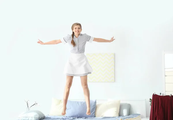 Young Chambermaid Uniform Jumping Bed Indoors — Stock Photo, Image