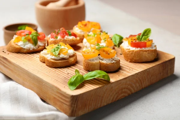 Tasty Bruschettas Tomatoes Wooden Board — Stock Photo, Image