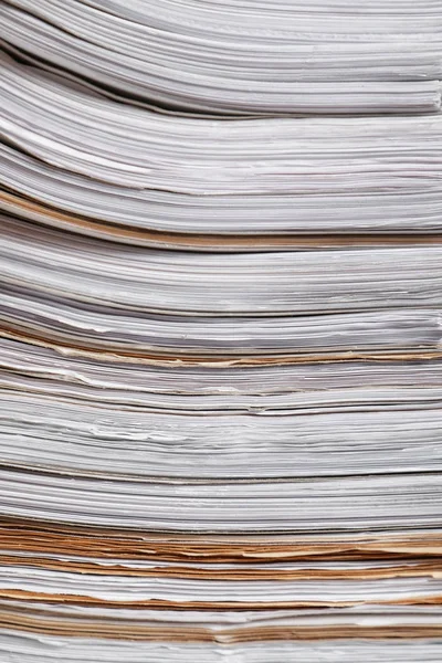 Stack of old paper documents in archive, closeup