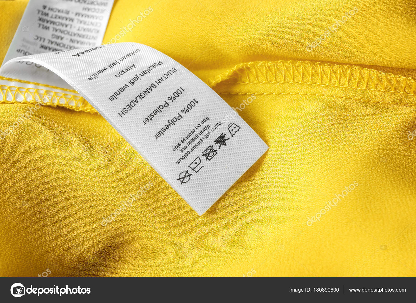Clothing Label Laundry Instructions Closeup Stock Photo by ©belchonock
