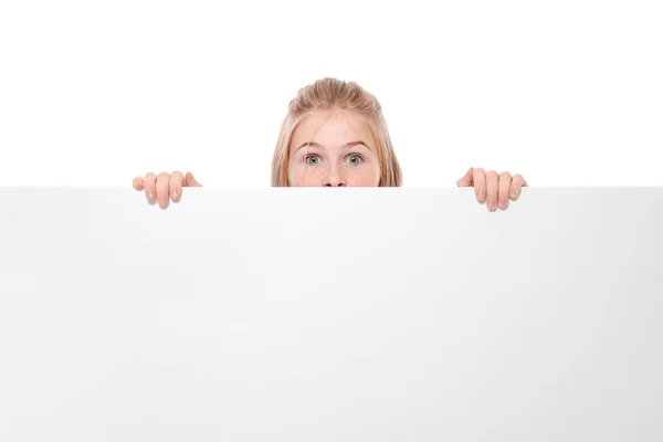 Cute girl with blank advertising board on white background — Stock Photo, Image