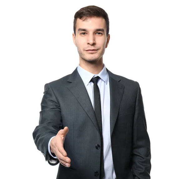 Car salesman stretching hand for handshake, on white background — Stock Photo, Image