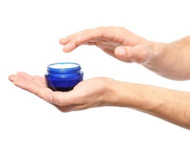 Adam el kremi, kavanoz ile üzerine beyaz izole