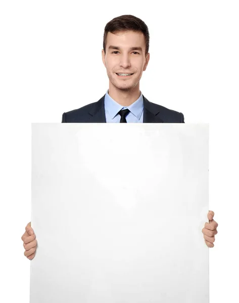 Hombre de negocios guapo con tablero de publicidad en blanco sobre fondo blanco — Foto de Stock