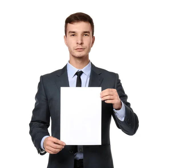 Handsome businessman with blank sheet of paper for advertising on white background — Stock Photo, Image