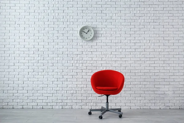 Modern Armchair White Brick Wall Stock Photo